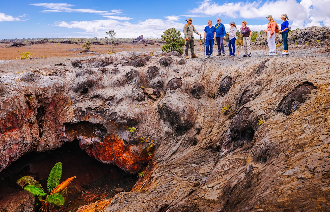 Guests exploring volcanic terrain on Hawaii adventure tour.