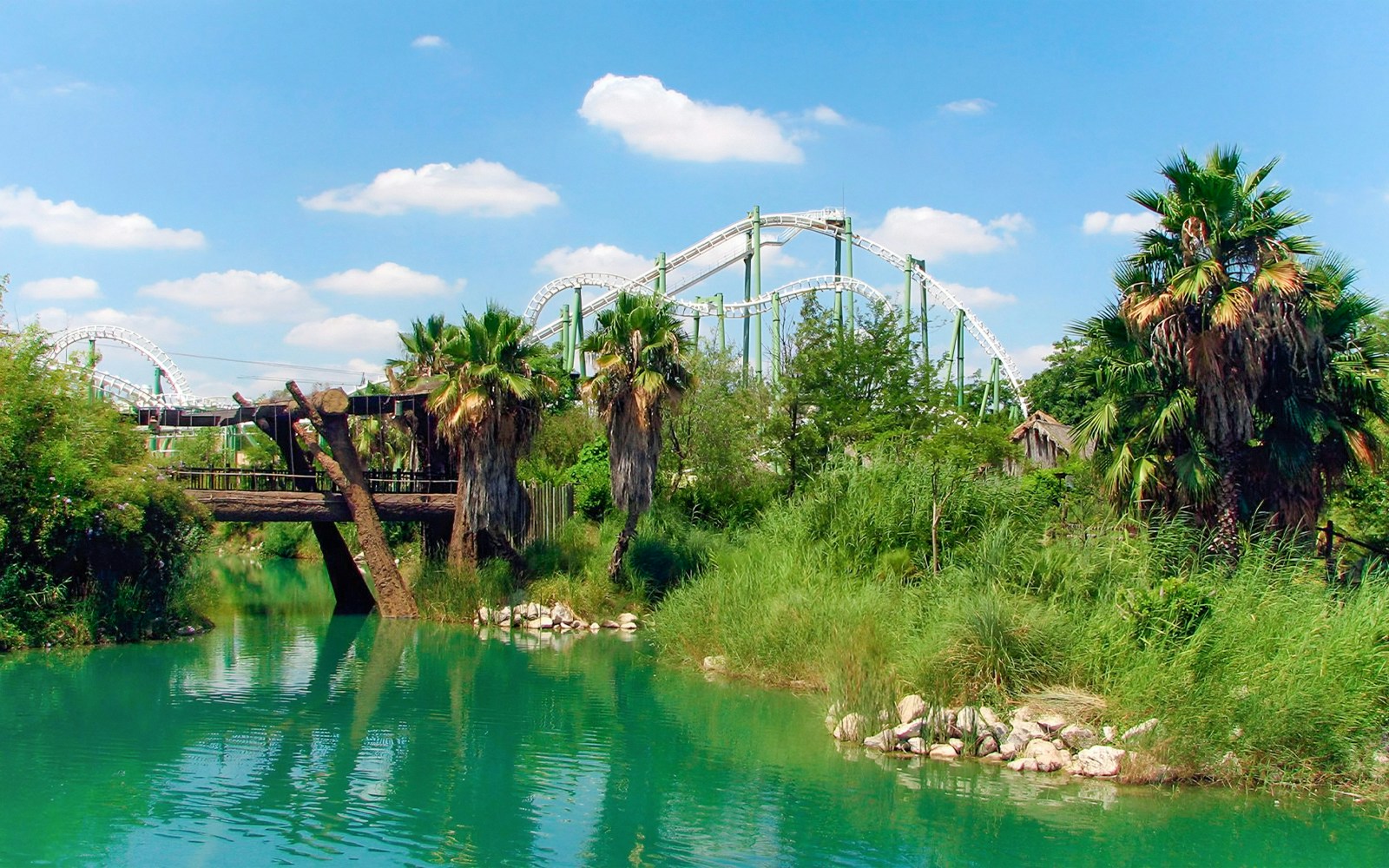 Amazon theme rainforest attraction at Isla Magica with lush greenery and water features.