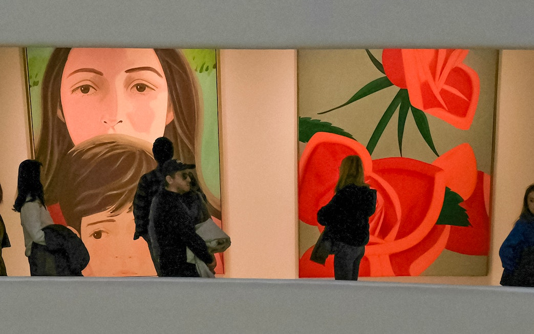 Visitors viewing modern art at the Guggenheim Museum, New York.