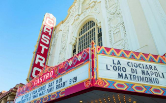 Castro Theatre marquee in San Francisco displaying film titles for a self-guided city exploration game.