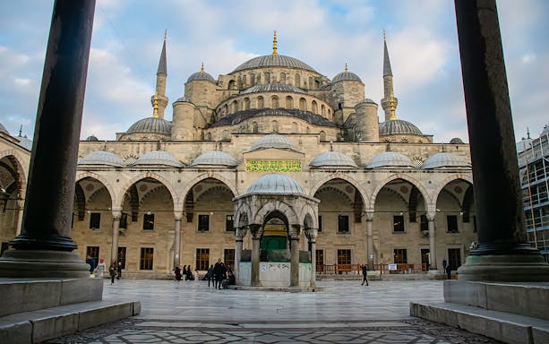 Blue Mosque courtyard with domes and minarets, Istanbul, part of Blue Mosque & Basilica Cistern tour.