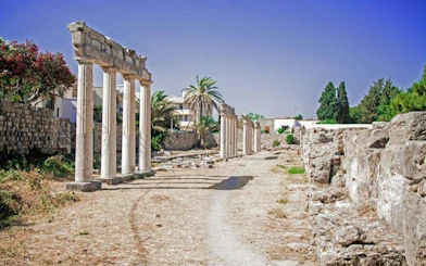 Ancient ruins of Asclepieion at Kos with stone columns and pathway, Rhodes.