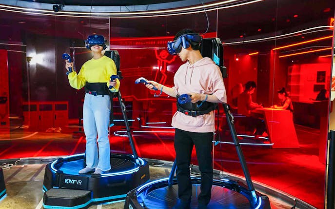 Couple playing virtual reality game at RED° TOKYO TOWER.