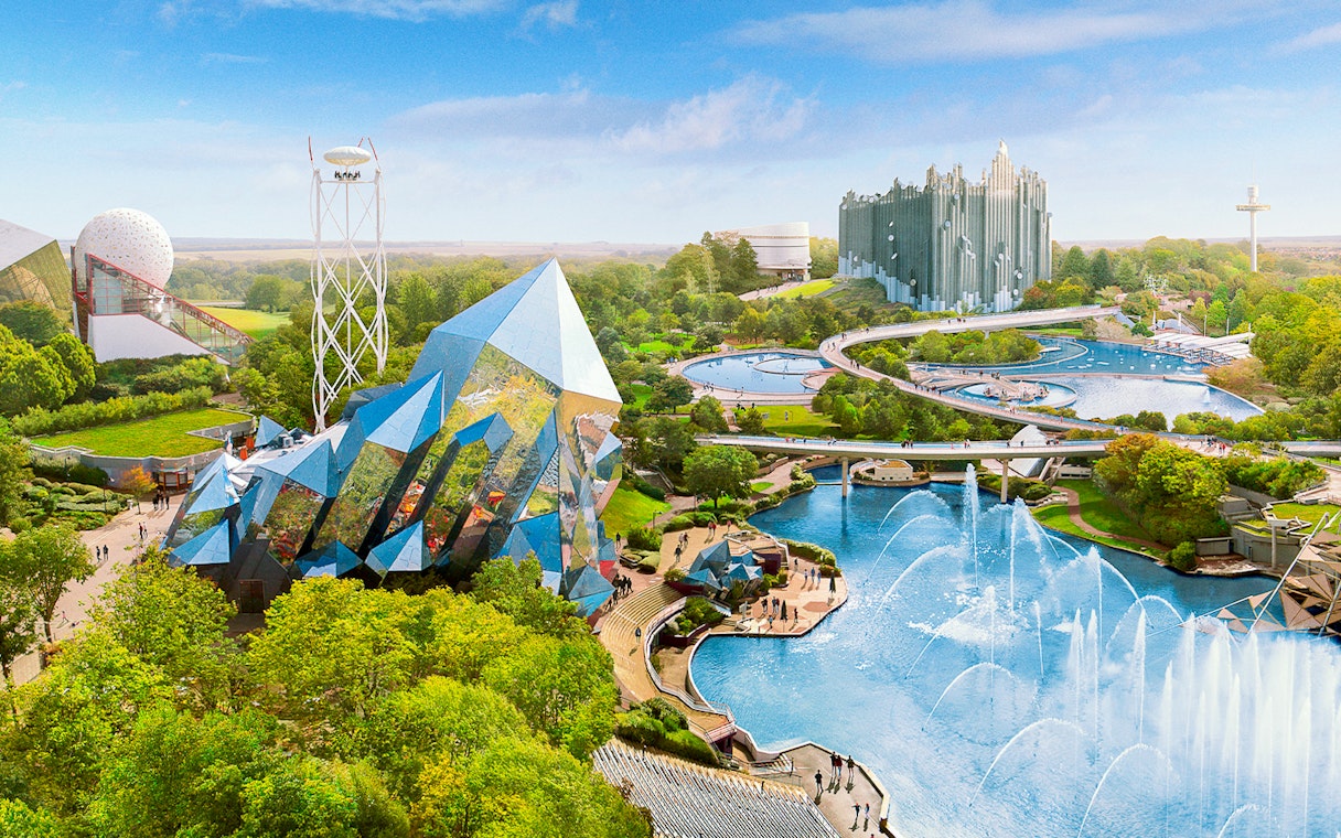 Futuristic architecture and water features at Futuroscope theme park in France.