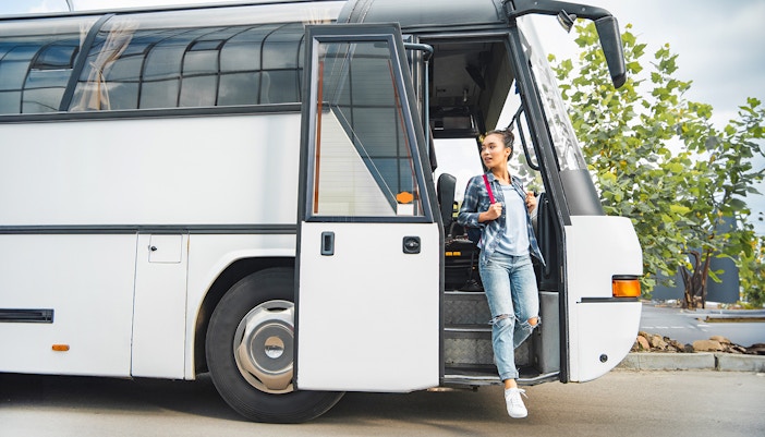 Coach transfer service at Tirana airport for tourists heading to Adventure Waterpark Desaru.
