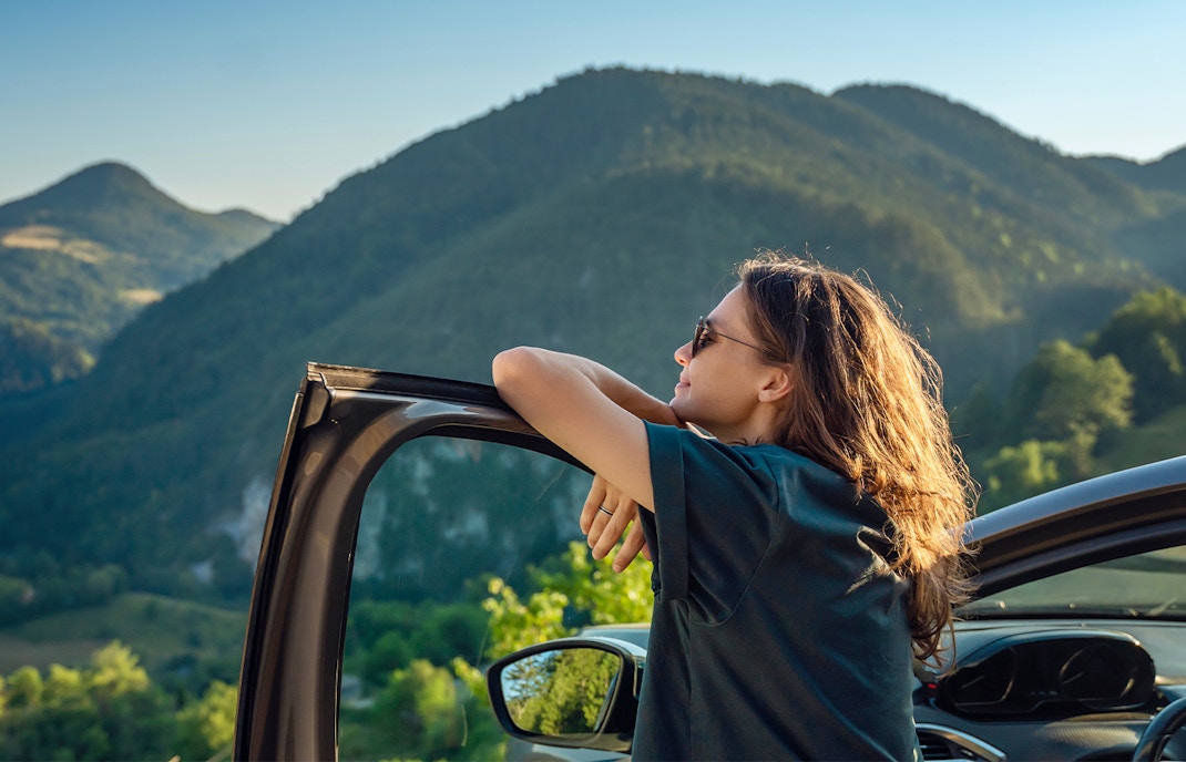 Car rental service in a bustling city street, ideal for exploring urban attractions.