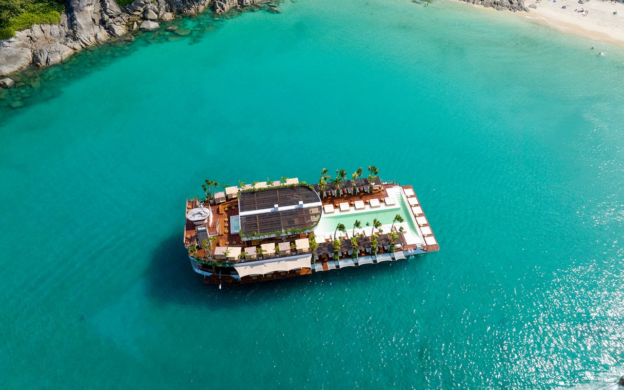 Floating beach club on turquoise waters, Yona Beach Club, Phuket.