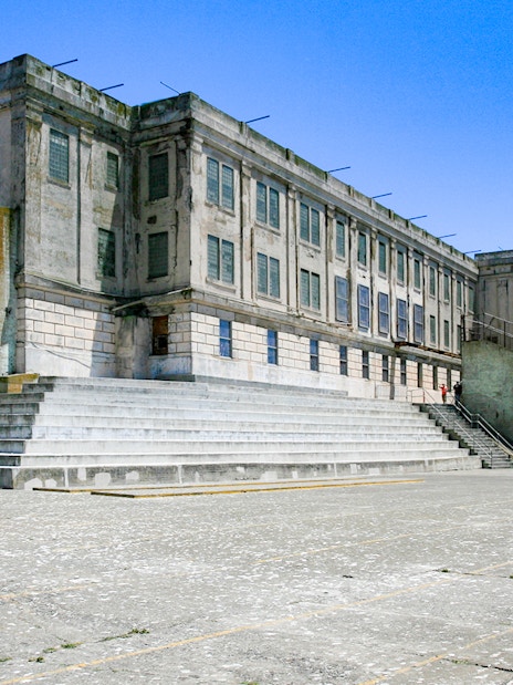 Alcatraz Island Recreation Yard with prison building, San Francisco, USA.