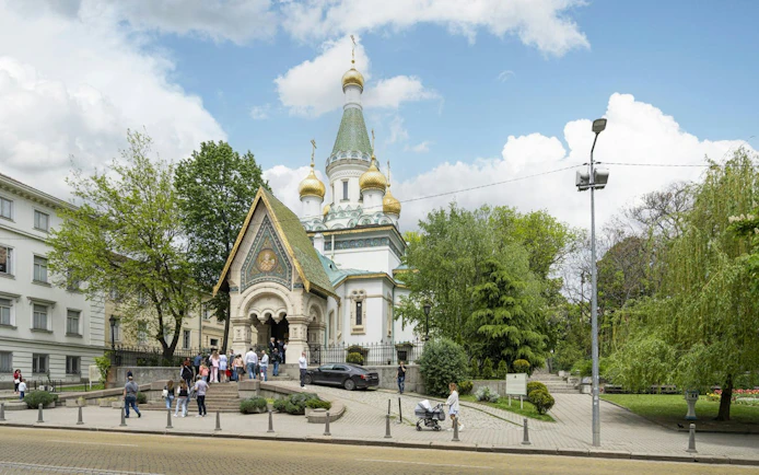 Russian Church in Sofia with visitors exploring the site.