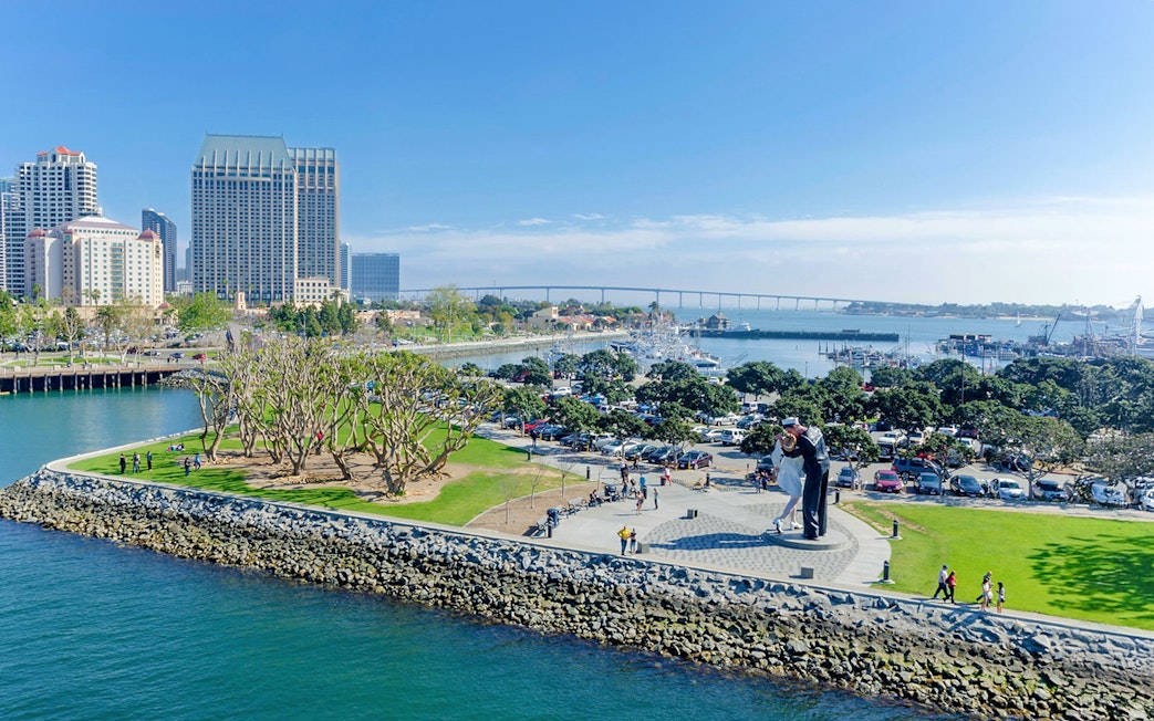 USS Midway Museum view with Unconditional Surrender statue in San Diego, California.