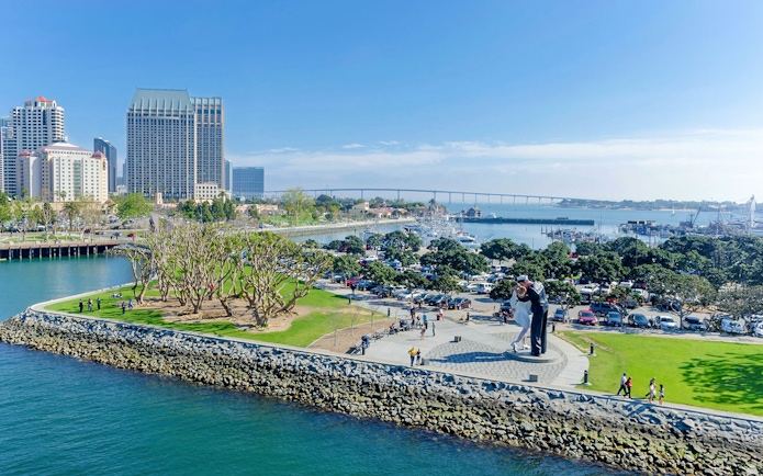 USS Midway Museum view with Unconditional Surrender statue in San Diego, California.