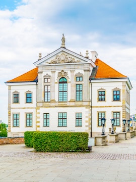 Fryderyk Chopin Museum building in Warsaw, Poland, with ornate facade and red roof.
