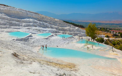 Guests enjoying thermal pools at Pamukkale, Turkey.
