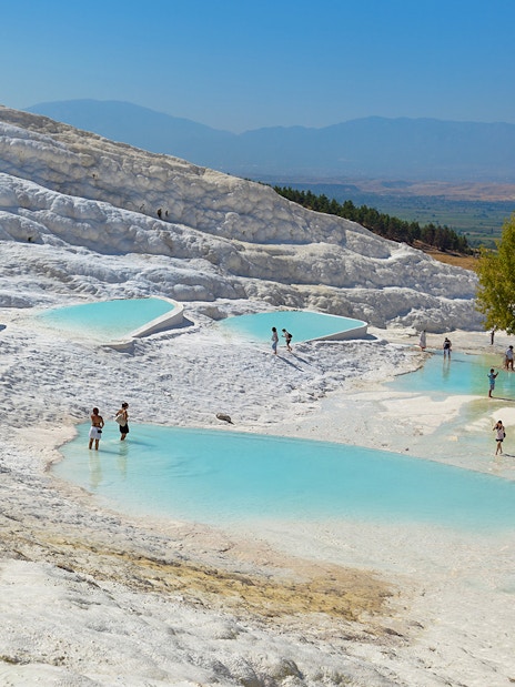 Guests enjoying thermal pools at Pamukkale, Turkey.