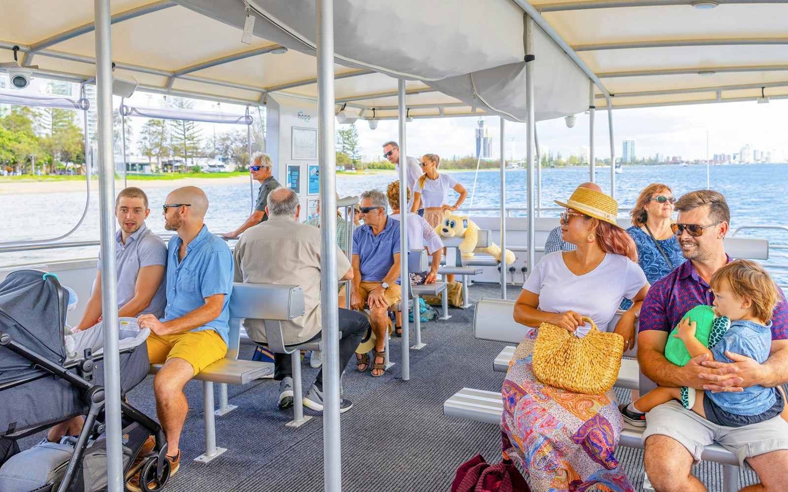 People enjoying a hop on hop off cruise on the Gold Coast, Australia.