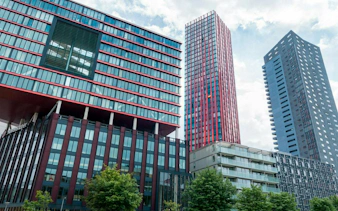 Modern skyscrapers in Rotterdam, part of the self-guided city exploration game.
