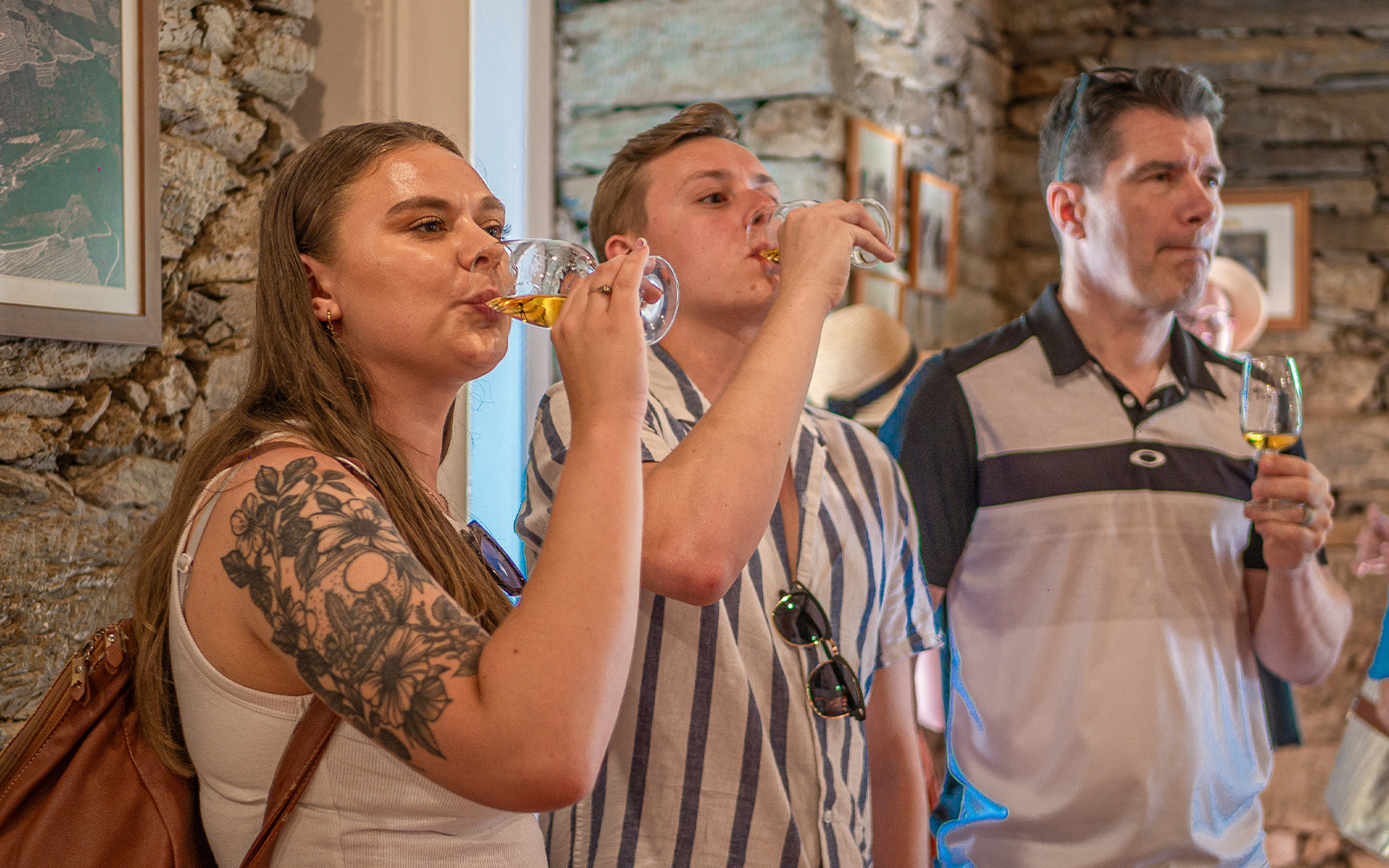 Tourists enjoying wine tasting in Douro Valley, Portugal.