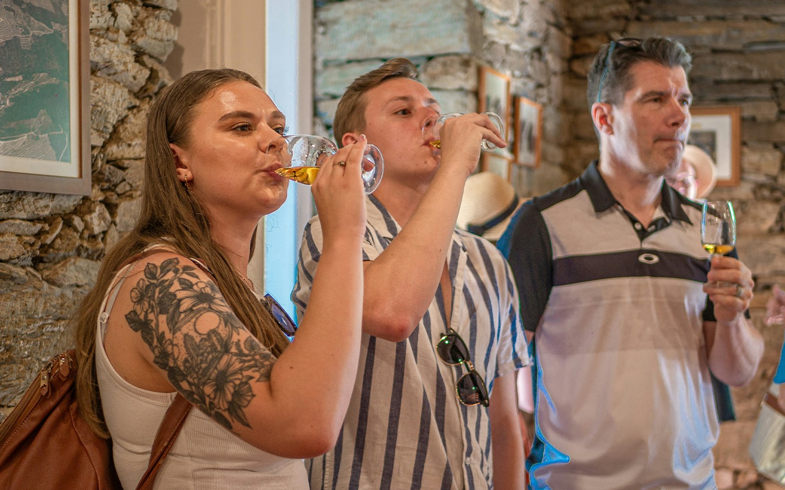 Tourists enjoying wine tasting in Douro Valley, Portugal.