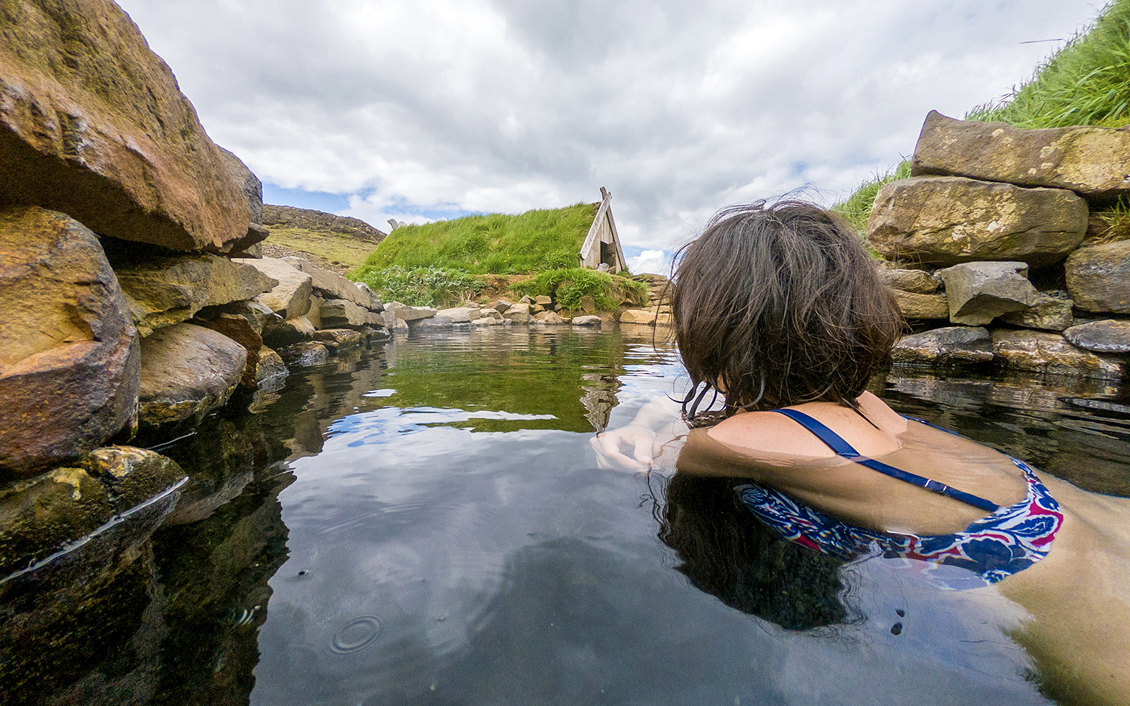 A female guests enjoying bathing in Secret Lagoon