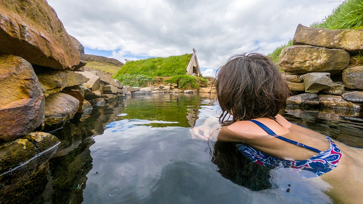 A female guests enjoying bathing in Secret Lagoon