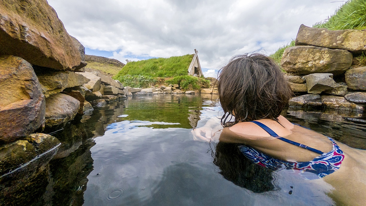 A female guests enjoying bathing in Secret Lagoon