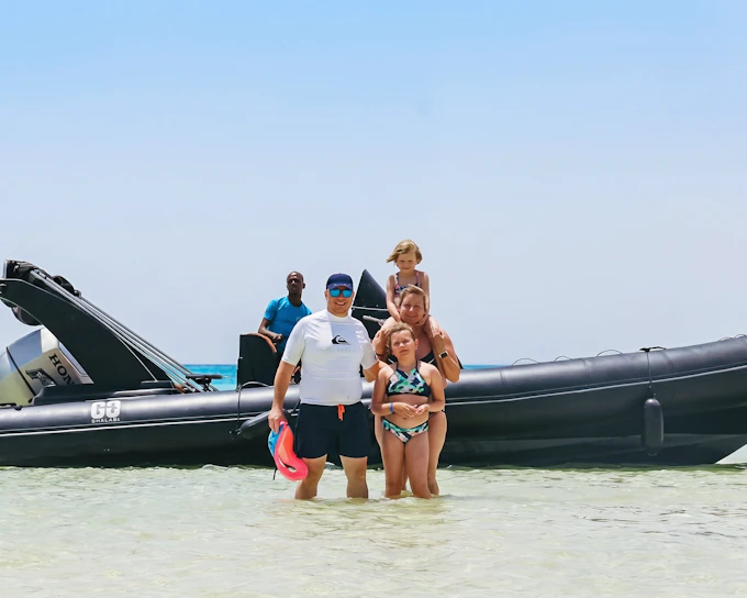 Orange Bay & Magawish Island: Speedboat with Snorkeling, Lunch & Transfers