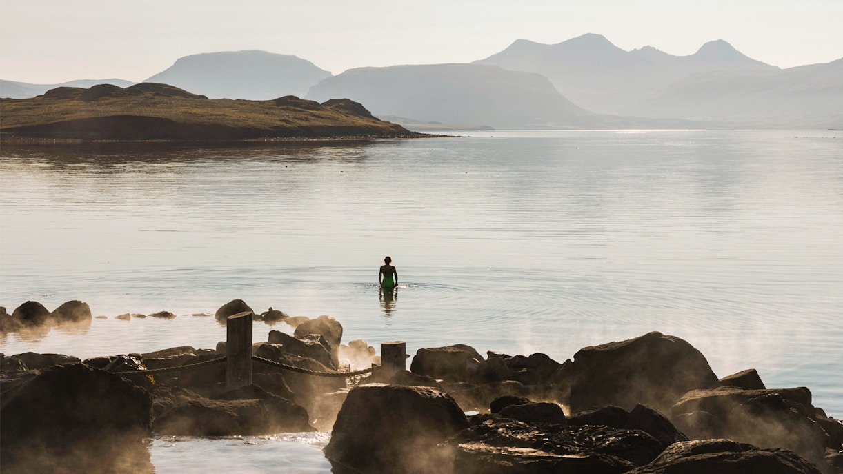 Hot Spring with scenic mountain backdrop near Reykjavík.