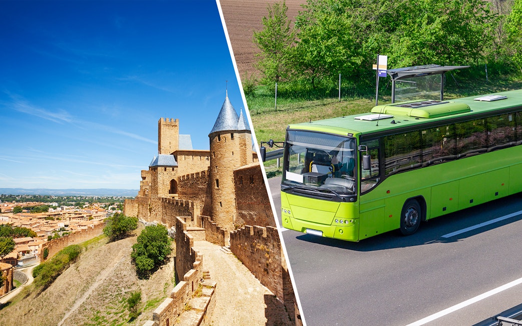 Carcassonne Castle with a tour bus on a nearby road.