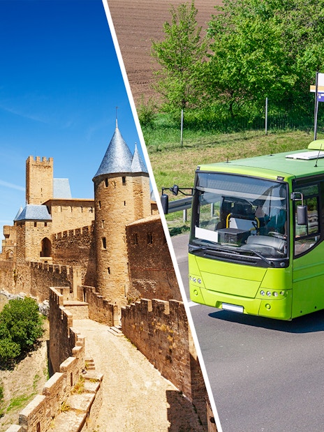 Carcassonne Castle with a tour bus on a nearby road.