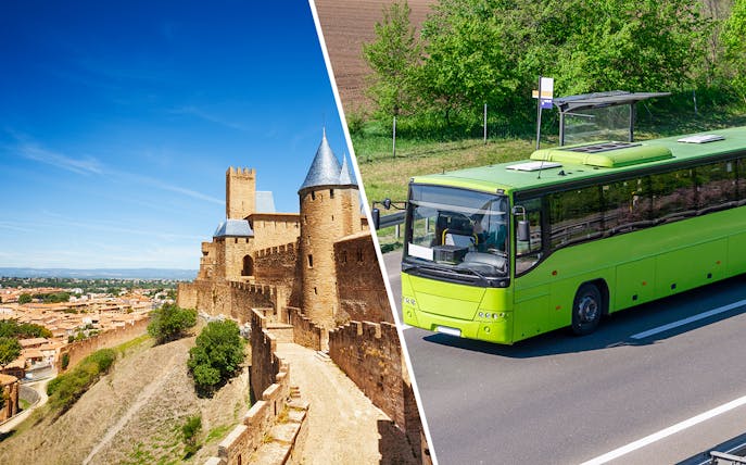 Carcassonne Castle with a tour bus on a nearby road.