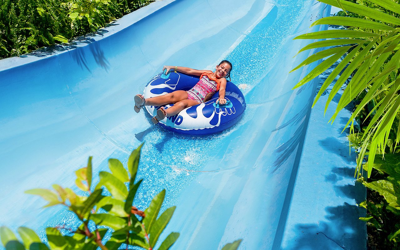 Visitors enjoying water slide at Aqualand Maspalomas.