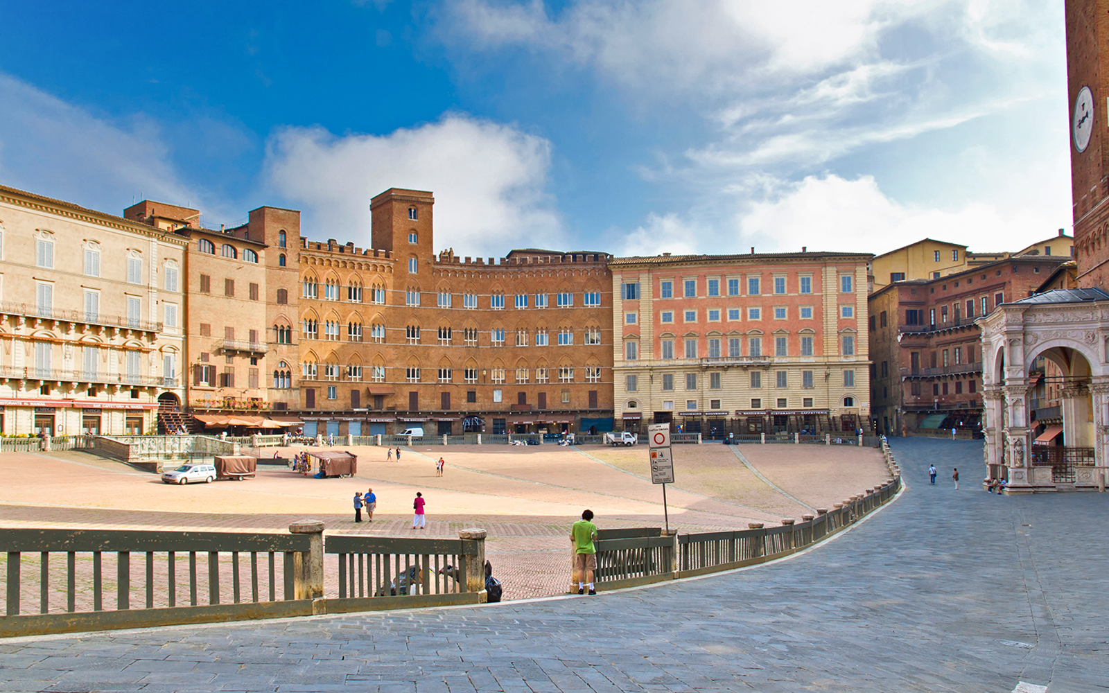 Palazzo Pubblico in Siena with its iconic tower and historic facade.