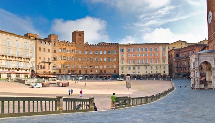 Palazzo Pubblico in Siena with its iconic tower and historic facade.