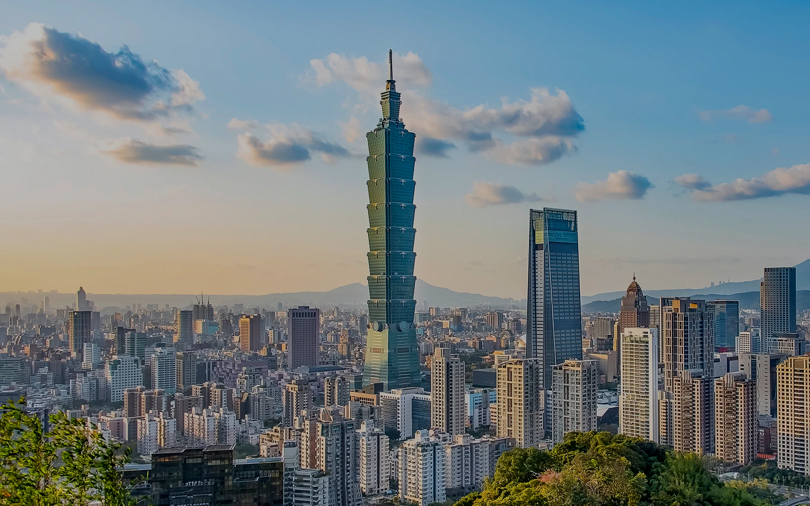 Taipei 101 towering over Taipei cityscape, view from observatory.