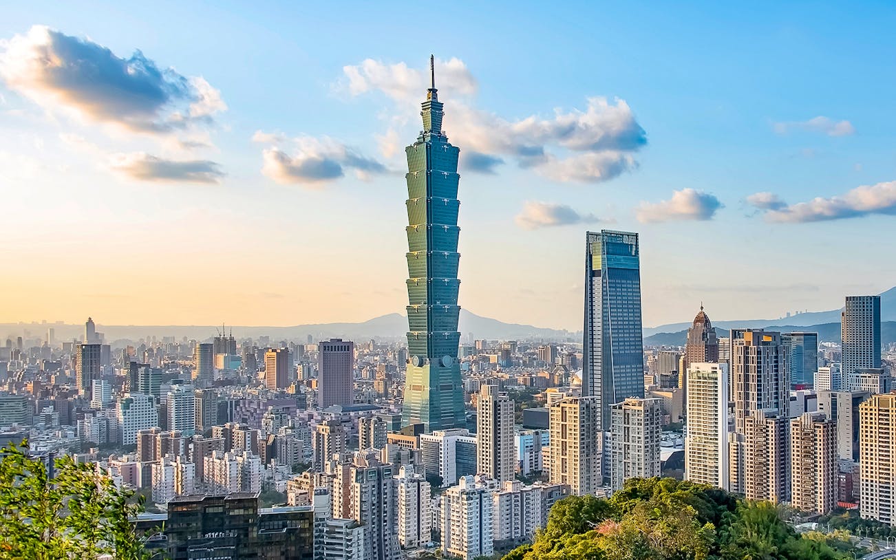 Taipei 101 towering over Taipei cityscape, view from observatory.