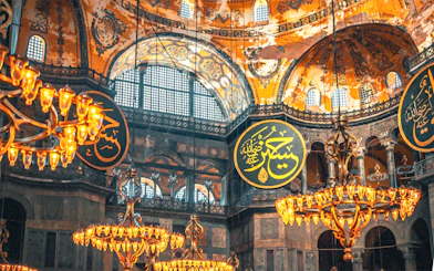 Hagia Sophia interior with chandeliers and Arabic calligraphy, Istanbul.