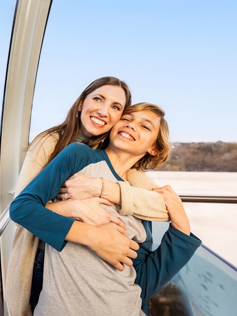 Couple enjoying a ride on the ICON Park observation wheel in Orlando.
