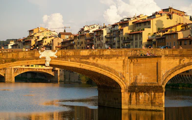 Florence's Ponte Vecchio over the Arno River during a guided gondola tour.