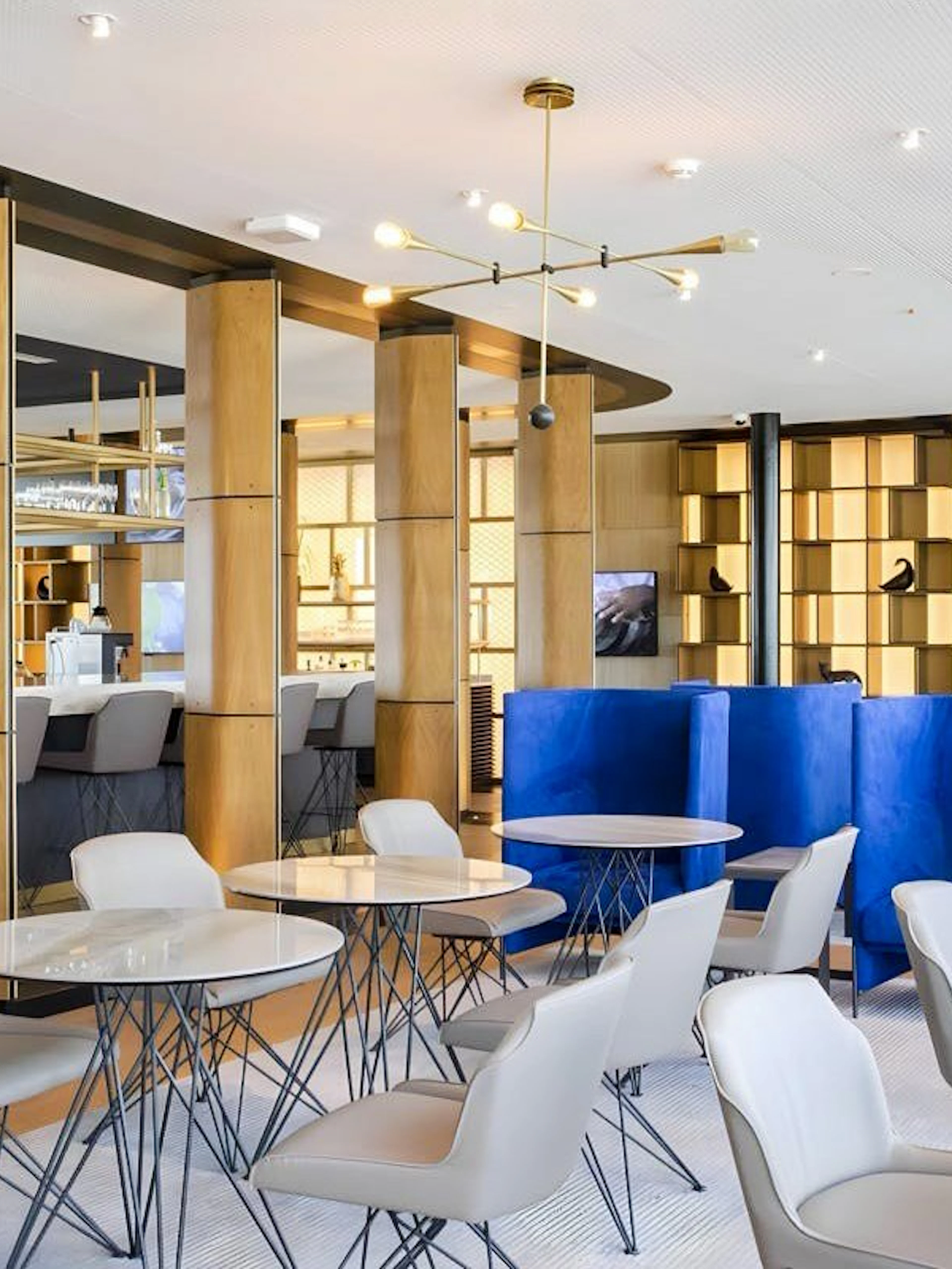 Primeclass Lounge seating area at Zurich Airport Terminal E with modern decor.