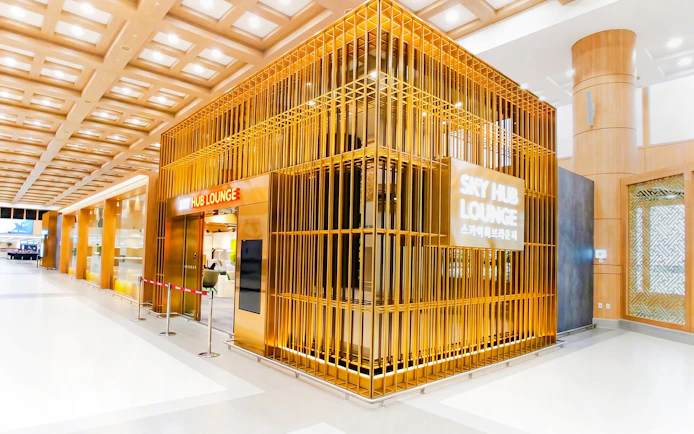 Entrance of Skyhub Lounge at Gimpo International Airport, Terminal 1, featuring modern design.