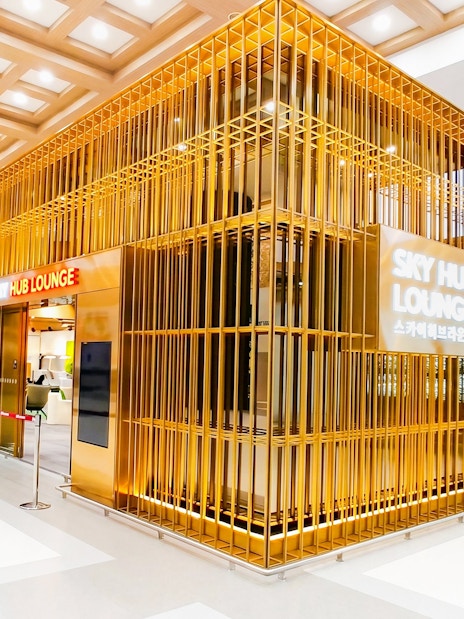 Entrance of Skyhub Lounge at Gimpo International Airport, Terminal 1, featuring modern design.
