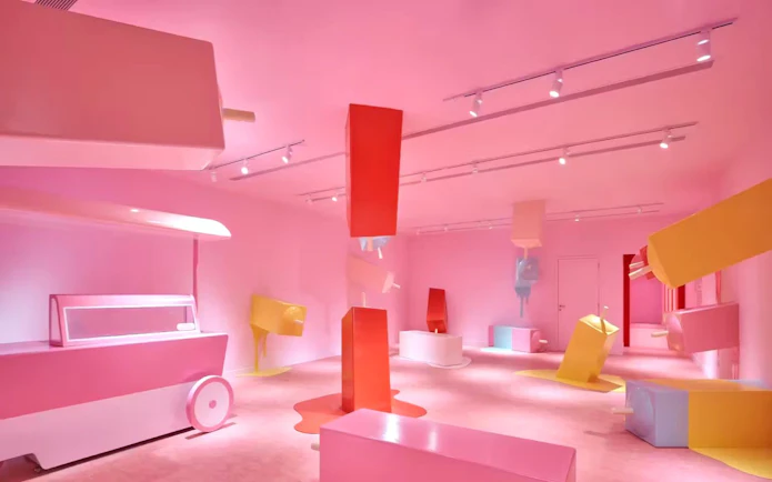 Interactive pink room with oversized ice cream bars at Museum of Ice Cream Singapore.