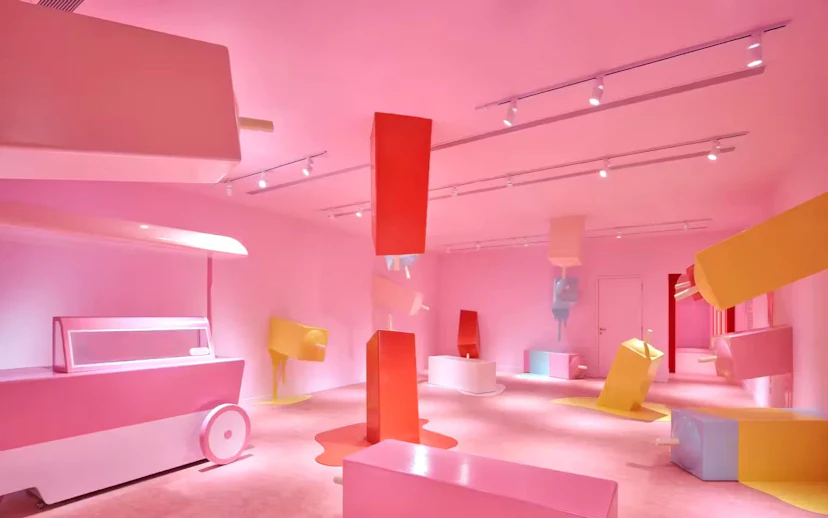 Interactive pink room with oversized ice cream bars at Museum of Ice Cream Singapore.