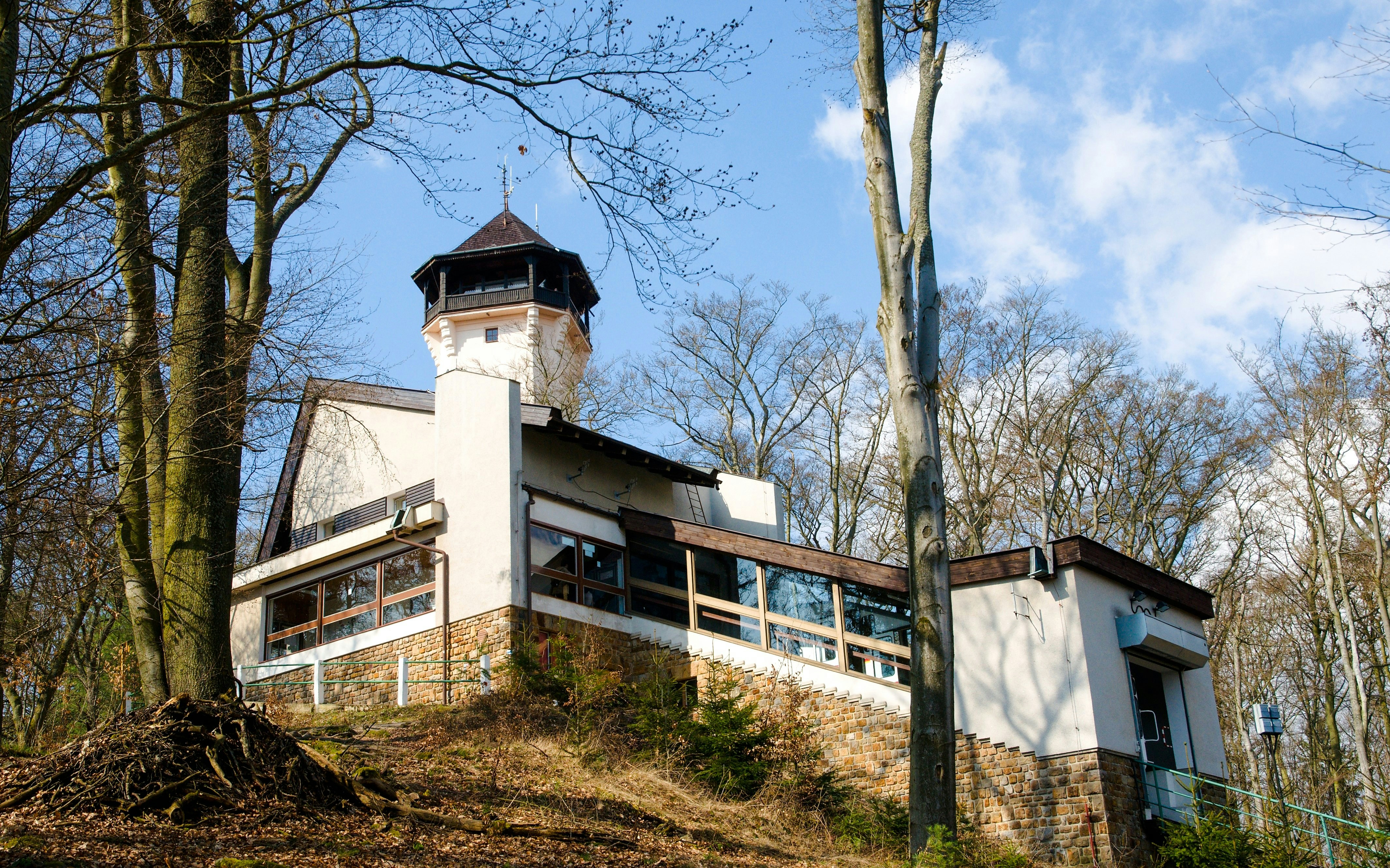 Lookout tower Diana surrounded by trees in Karlovy Vary.