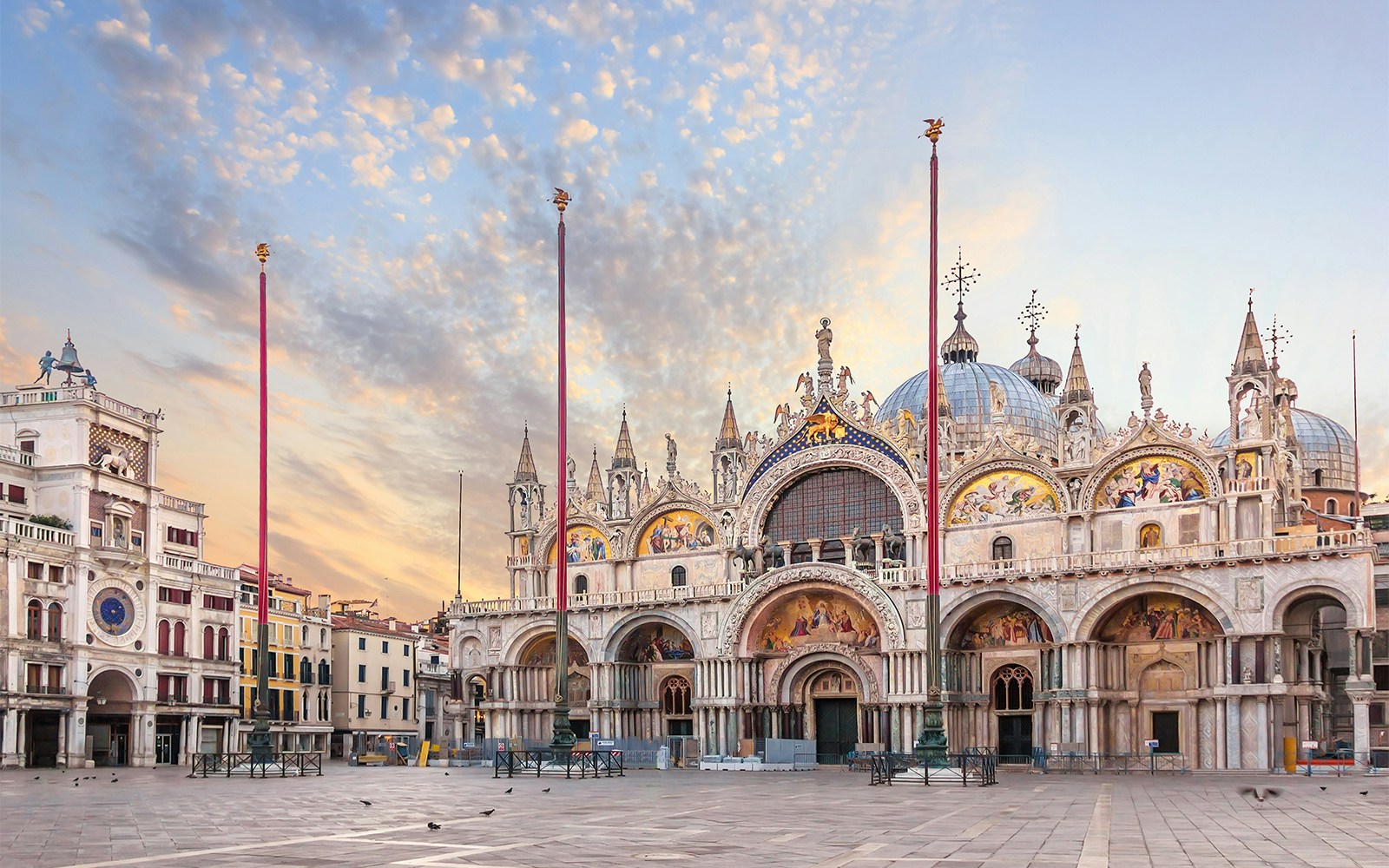 St. Mark's Basilica, Venice, with ornate facade and detailed mosaics.