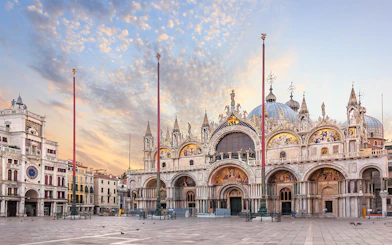 St. Mark's Basilica facade with ornate architecture and detailed mosaics in Venice.