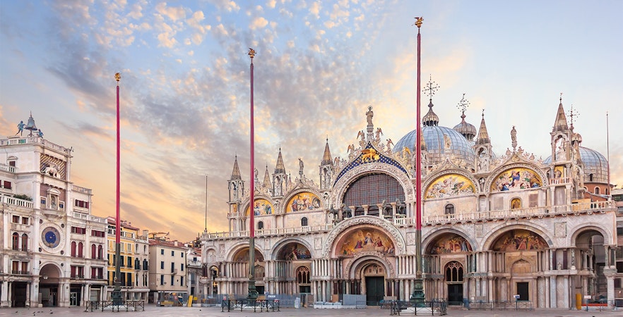St. Mark's Basilica facade with ornate architecture and detailed mosaics in Venice.