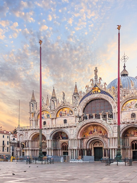 St. Mark's Basilica facade with ornate architecture and detailed mosaics in Venice.