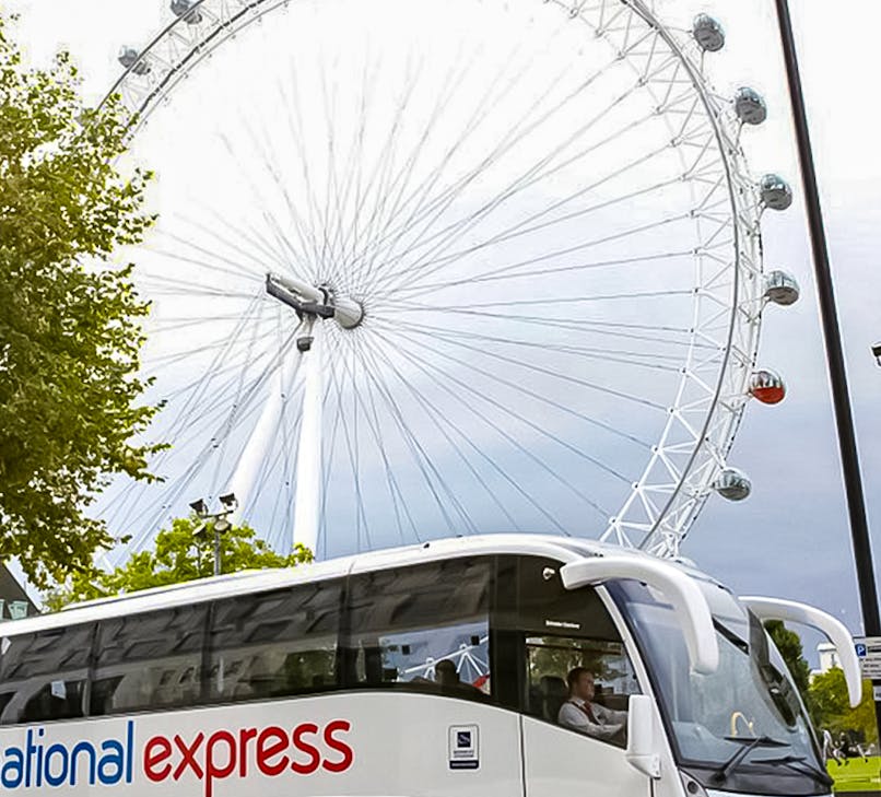 National Express coach traveling from London with passengers onboard.