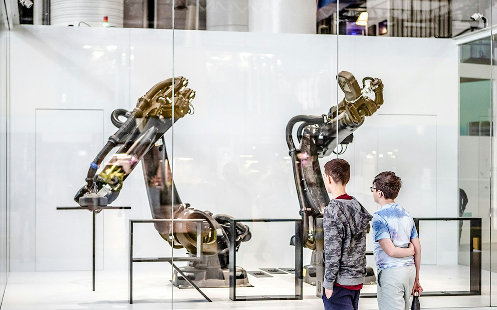 Children exploring interactive exhibit at Science & Industry Museum, Paris, France.